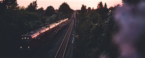 Download wallpaper 2560x1024 train, railway, rails, trees, twilight ...