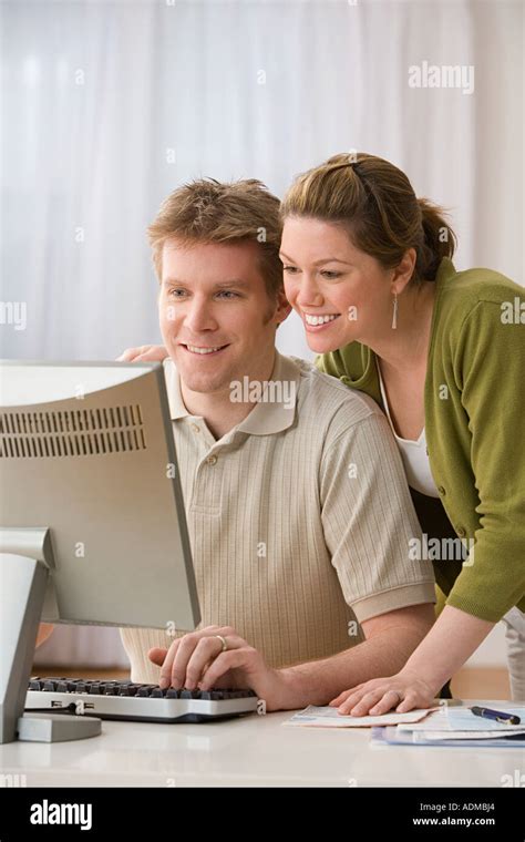 Couple Using Computer 的图像结果