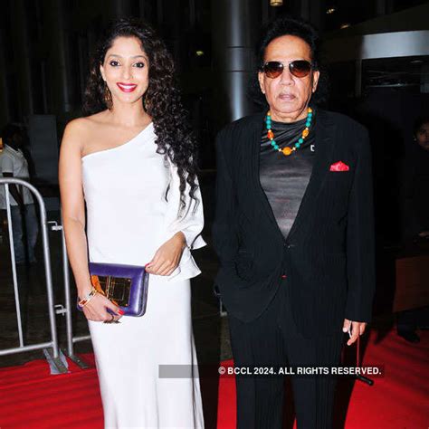 Suman Ranganathan poses with Ranganathan during the 60th Filmfare ...
