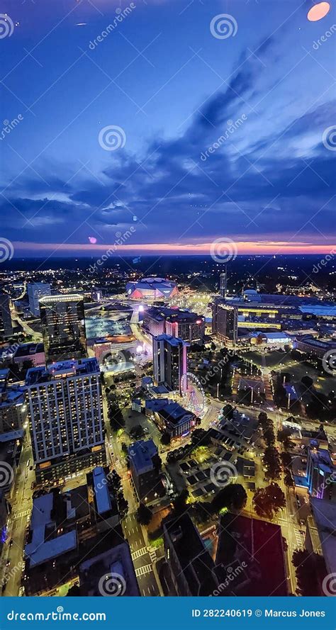 The City Skyline at Sunset with Mercedes-Benz Stadium, the SkyView ...