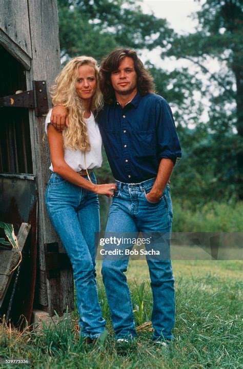 John Cougar Mellencamp stands outdoors with his wife Victoria. News ...