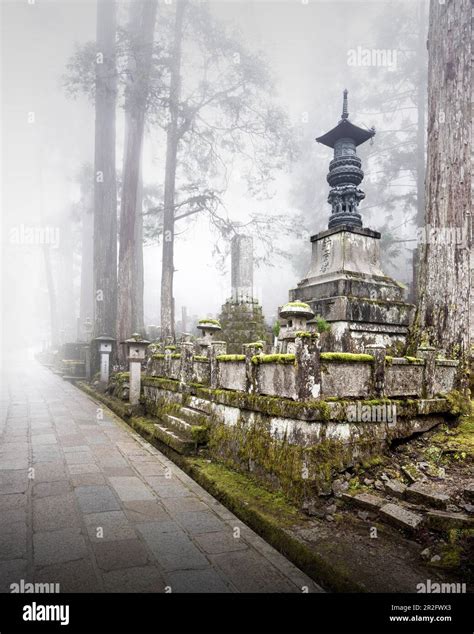 Fog over one of 200, 000 tombs at the old Okunion cemetery in Koya-San ...
