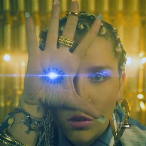 In "Crazy Kids" video Ke$ha was seen showing an evil eye tattoo on her ...