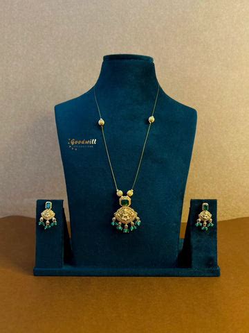 GREEN STONE LAKSHMI INVISIBLE CHAIN NECKLACE