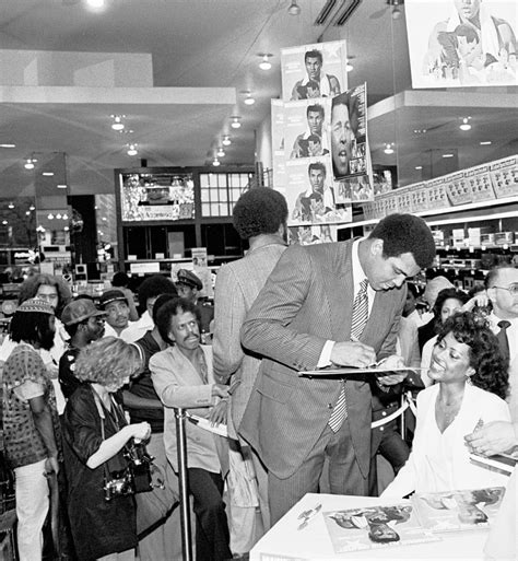 Muhammad Ali and Veronica Porsche at an album signing at Sam Goody ...