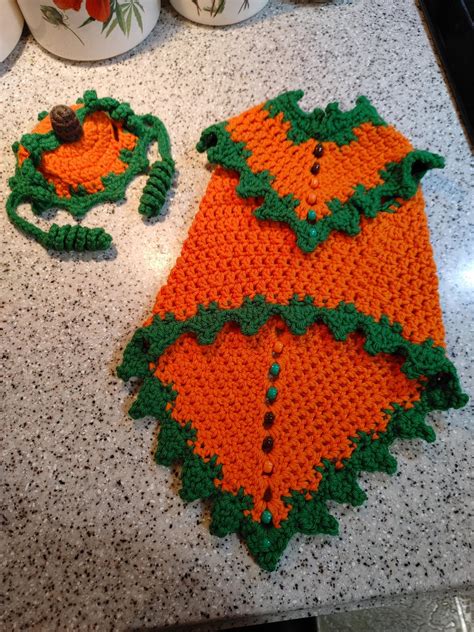 Just finished making a cute little pumpkin outfit for my cat, Helios ...