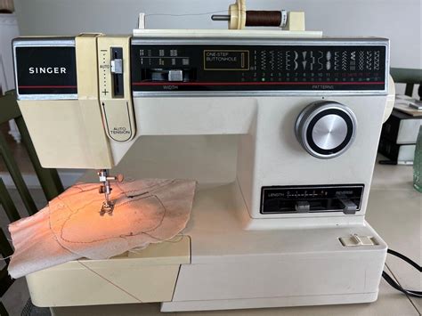 Image result for Singer Sewing Machine Model 6235 Manual