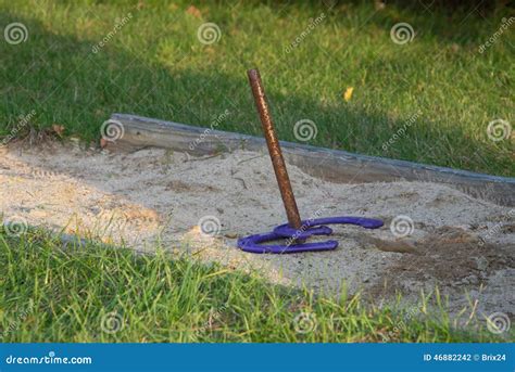 Two Purple Horseshoes on a Horseshoe Stake Stock Photo - Image of ...