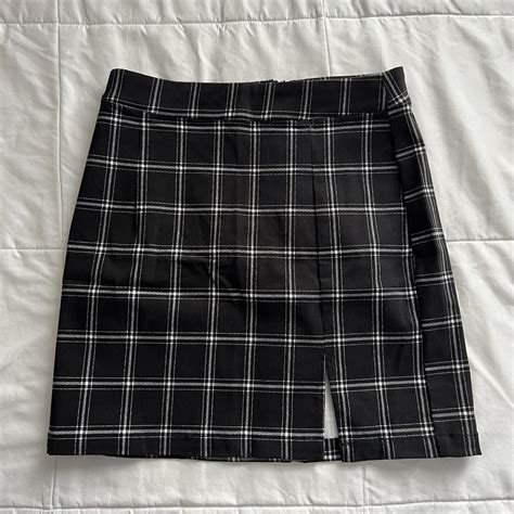 -small black plaid skirt with small slit -never... - Depop