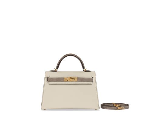 A CUSTOM NATA & ÉTOUPE EPSOM LEATHER MINI KELLY 20 II WITH GOLD HARDWARE, HERMÈS, 2021 | Christie’s