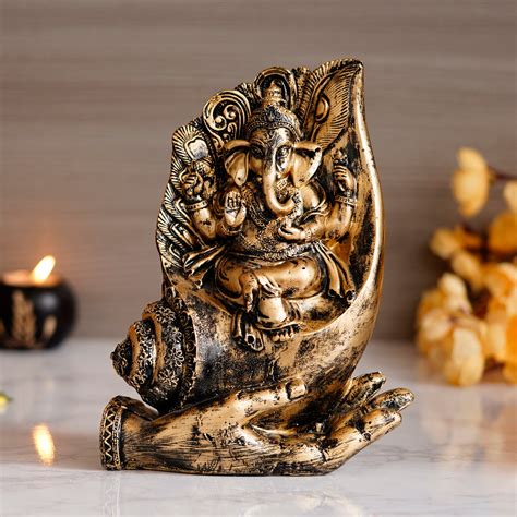 Lord Ganesha Sitting on a Hand Base Handcrafted Decorative Polyresin ...