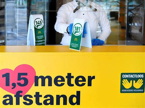 Reminding you to maintain distance - McDonald's new style of working ...