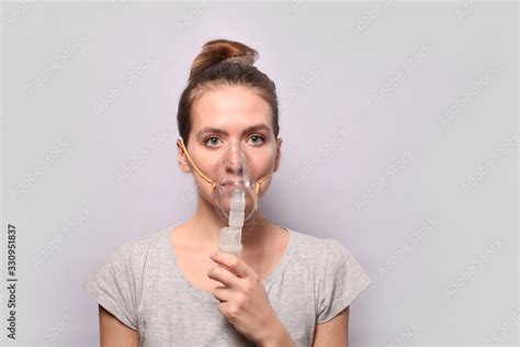 Image result for Using Inhaler and Mask