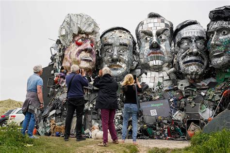 The Giant Heads Of 'Mount Recyclemore' Highlight The World's E-Waste ...