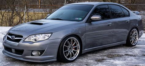 Silver Subaru Legacy Sedan in Snow