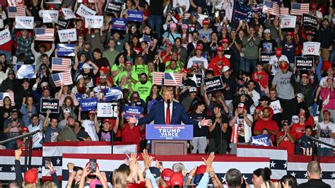 White supremacist group's slogan waved at Trump/Vance campaign event