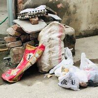 Sdmc — filthy pile of garbage in khirki village, dumped by neighbour
