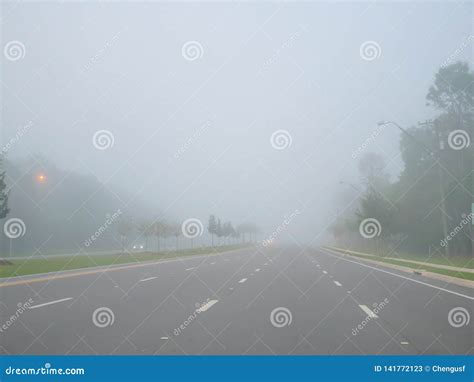 Big road and morning fog stock image. Image of autumn - 141772123
