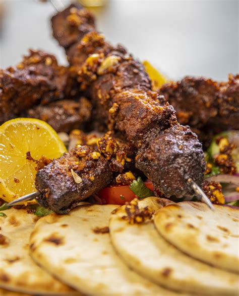 Cameroonian Spiced Beef & Peanut Kebabs with Tomato Salad - Ainsley ...