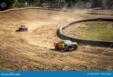 Two Offroad RC Cars Racing on a Track Stock Photo - Image of oudoor ...