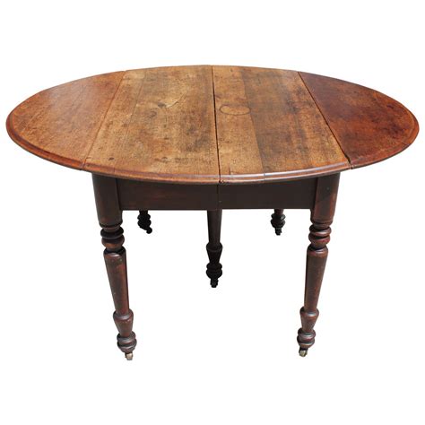 Early 19th Century Round Rustic Drop-Leaf Table at 1stDibs