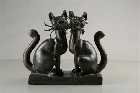"Cat With Fish": Steel Grey Sculpture by Tapas Sarkar – ArtZolo.com