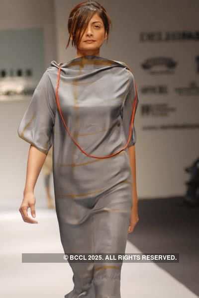 A model displays a creation by designer Savio Jon during Delhi Fashion ...
