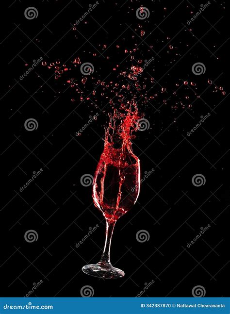Pouring Clear Wine Glass with Spilled Red Liquid in Air. Red Wine ...