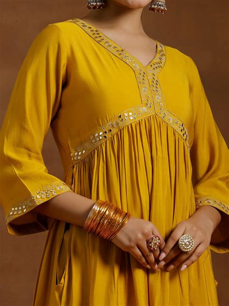 Buy Mustard Solid Silk Blend A-Line Kurta With Trousers Online at Rs ...