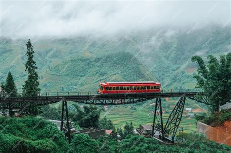Red train while going to cable car to the top of the fansipan mountain ...