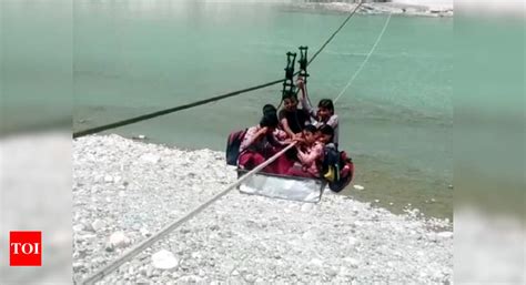 Trolley ropeway across river on border with Himachal tottering ...