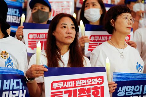 韩国民众集会抗议日本政府决定启动核污染水排海_新华社_王益亮_在野党