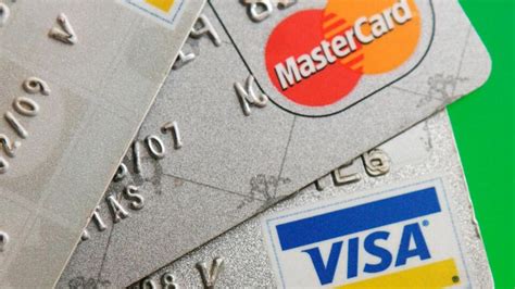 Visa and Mastercard to end 20-year legal feud? Credit card giants mull ...