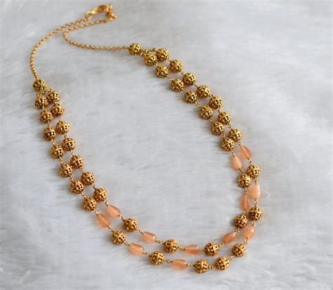 Antique gold tone peach beaded double layer mala dj-46836 – dreamjwell