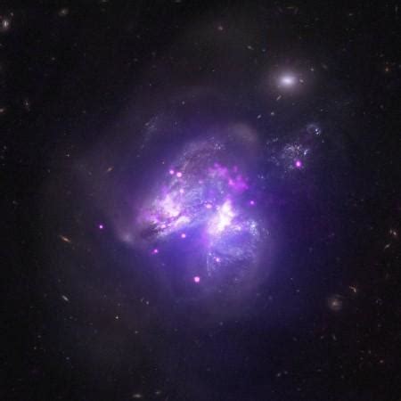 NASA's Chandra X-ray Observatory reveals new image of Arp 299, a ...