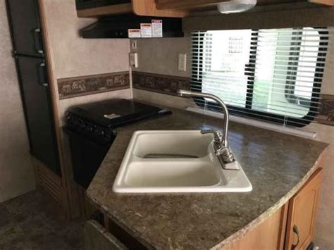 Image result for 2011 Keystone Springdale 266RLSSR