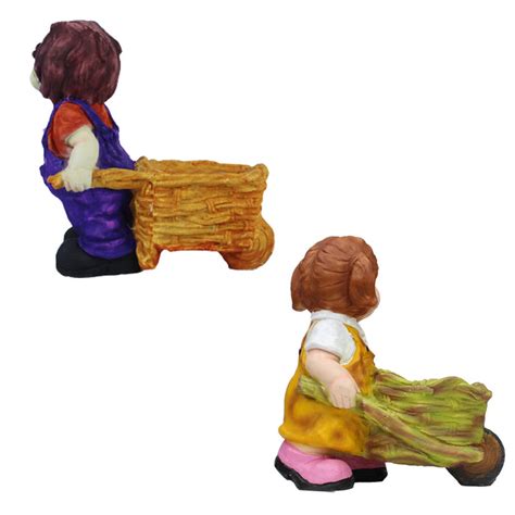 Boy & Girl Pushing Cart Planter for Garden Decoration — Wonderland ...