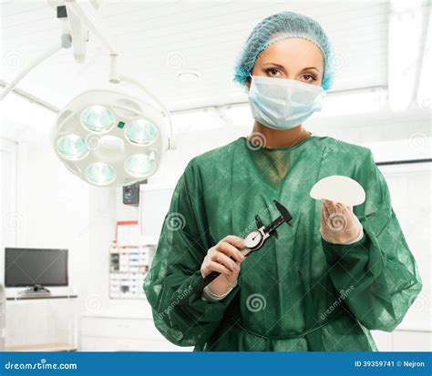 Surgeon Woman Holding Silicon Breast Implants Stock Image - Image of operation, healthcare: 39359741