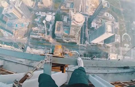 These Guys Climbing The Worlds 2nd Tallest Building Without Any Safety ...