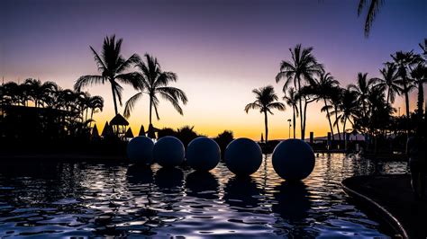 Download wallpaper 2048x1152 palm trees, pool, balls, silhouettes ...