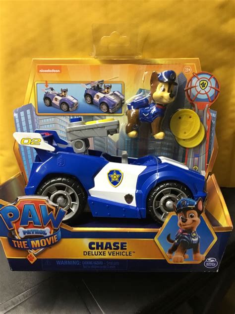 Buy PAW Patrol The Movie Chase DLX Vehicle Dog Figurine Police Car Disc ...