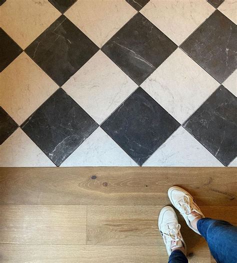 Tile + wood in 2025 | Checkered floors, White tile floor, Black and ...