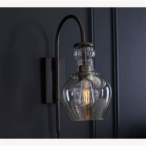 Pottery Barn Flynn Recycled Glass Plug-In Sconce - AptDeco