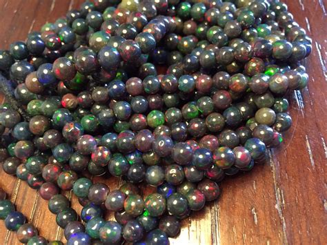 Buy Rare Black Opal Smooth Round Beads Ethiopian Welo Black Opal Online ...