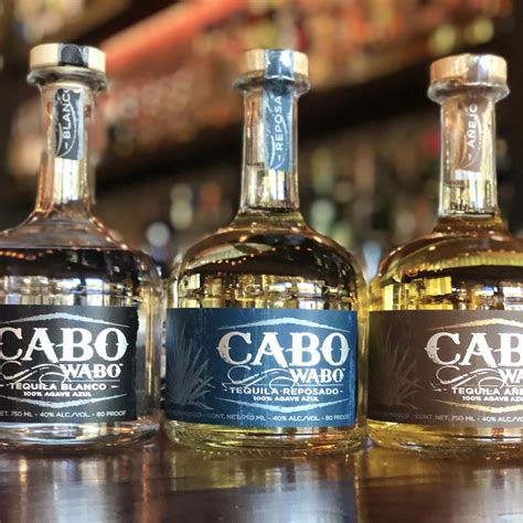 Download Cabo Wabo Tequila Bottles Wallpaper | Wallpapers.com