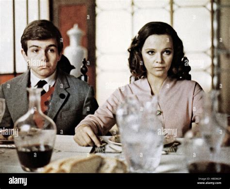 MALIZIA, from left: Alessandro Momo, Laura Antonelli, 1973 Stock Photo ...