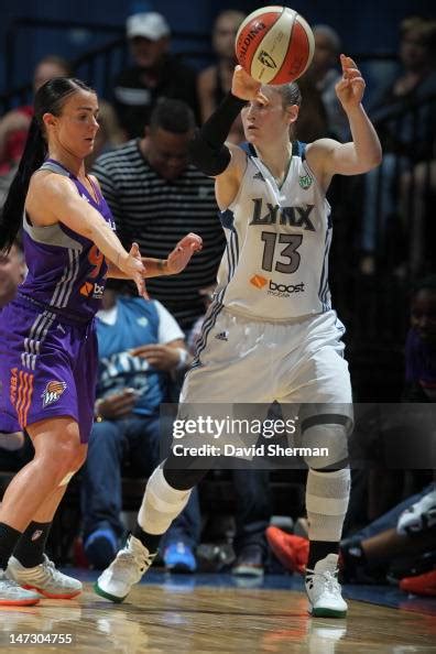 Lindsay Whalen of the Minnesota Lynx passes the ball against Samantha ...
