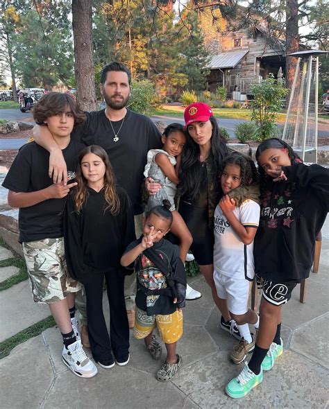 Mason Disick, 13, poses for rare family photo with dad Scott, aunt Kim ...