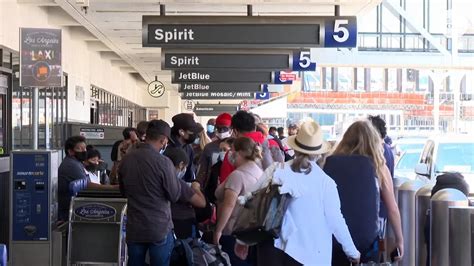 Woman arrested after attacking two Spirit Airlines flight attendants