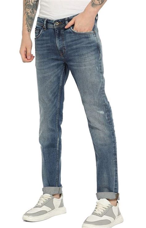 Carrot Fit Mid Rise Denim